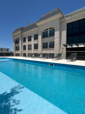 Apart France - Monoambiente con piscina, gym y estacionamiento